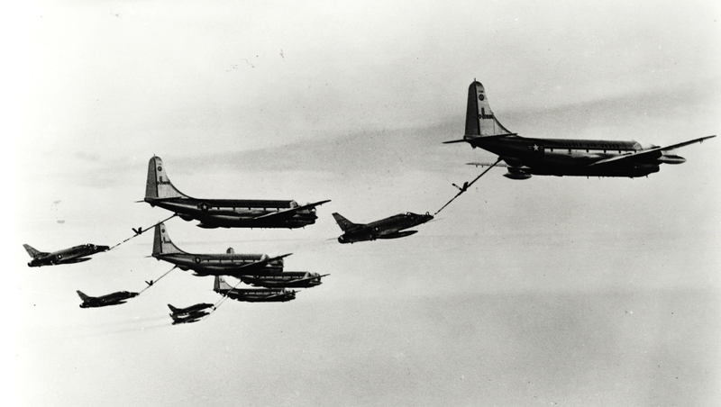 KC-97G Tanker and F-100s flying at a high AoA to allow a meet up with a glorified B-29